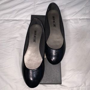 Gently used black flats